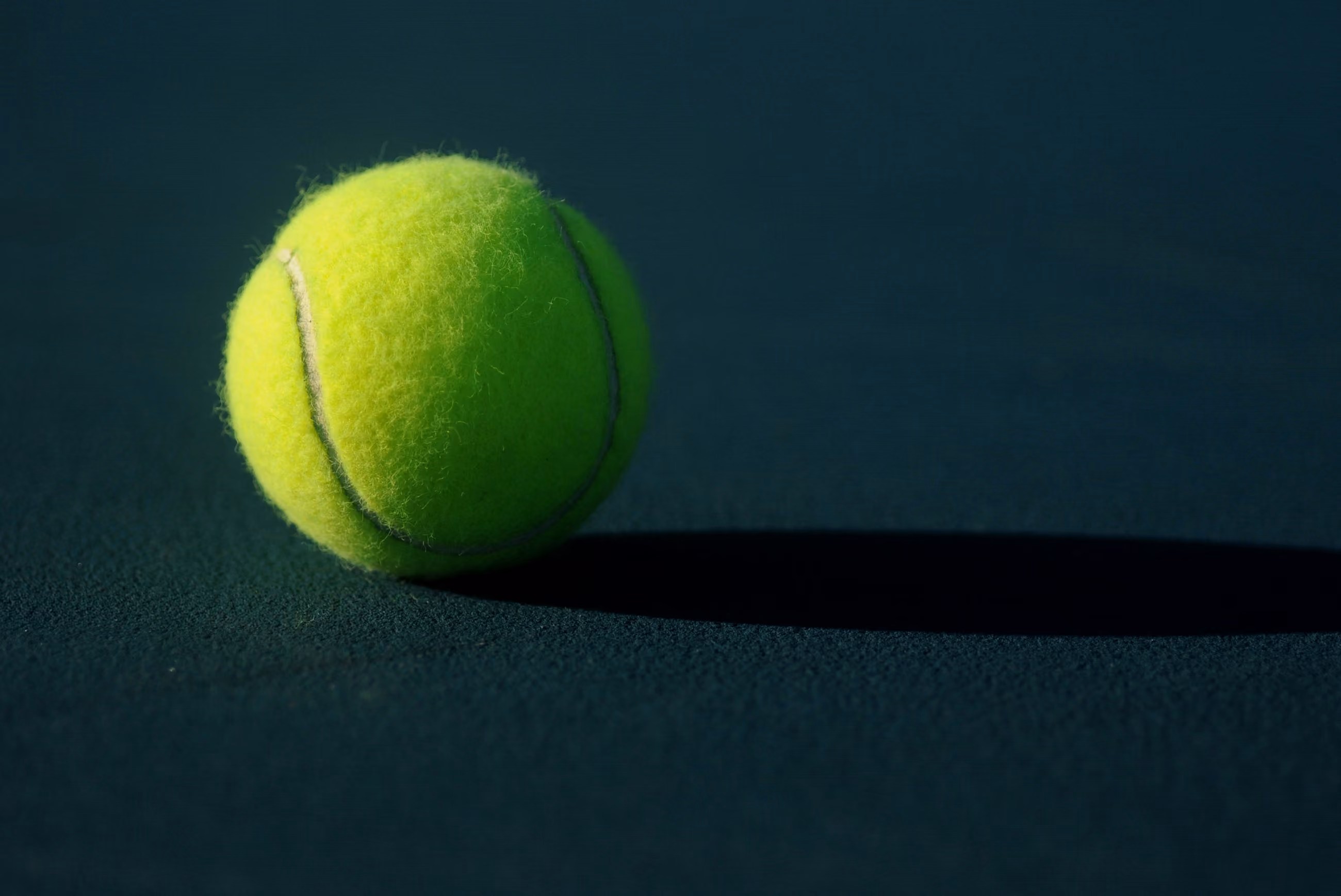 A tennis ball on a court at the ATP Finals
